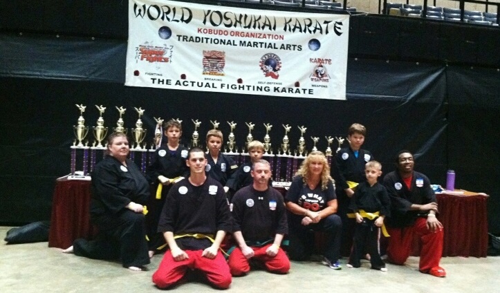 Picture of competitors posing with trophies